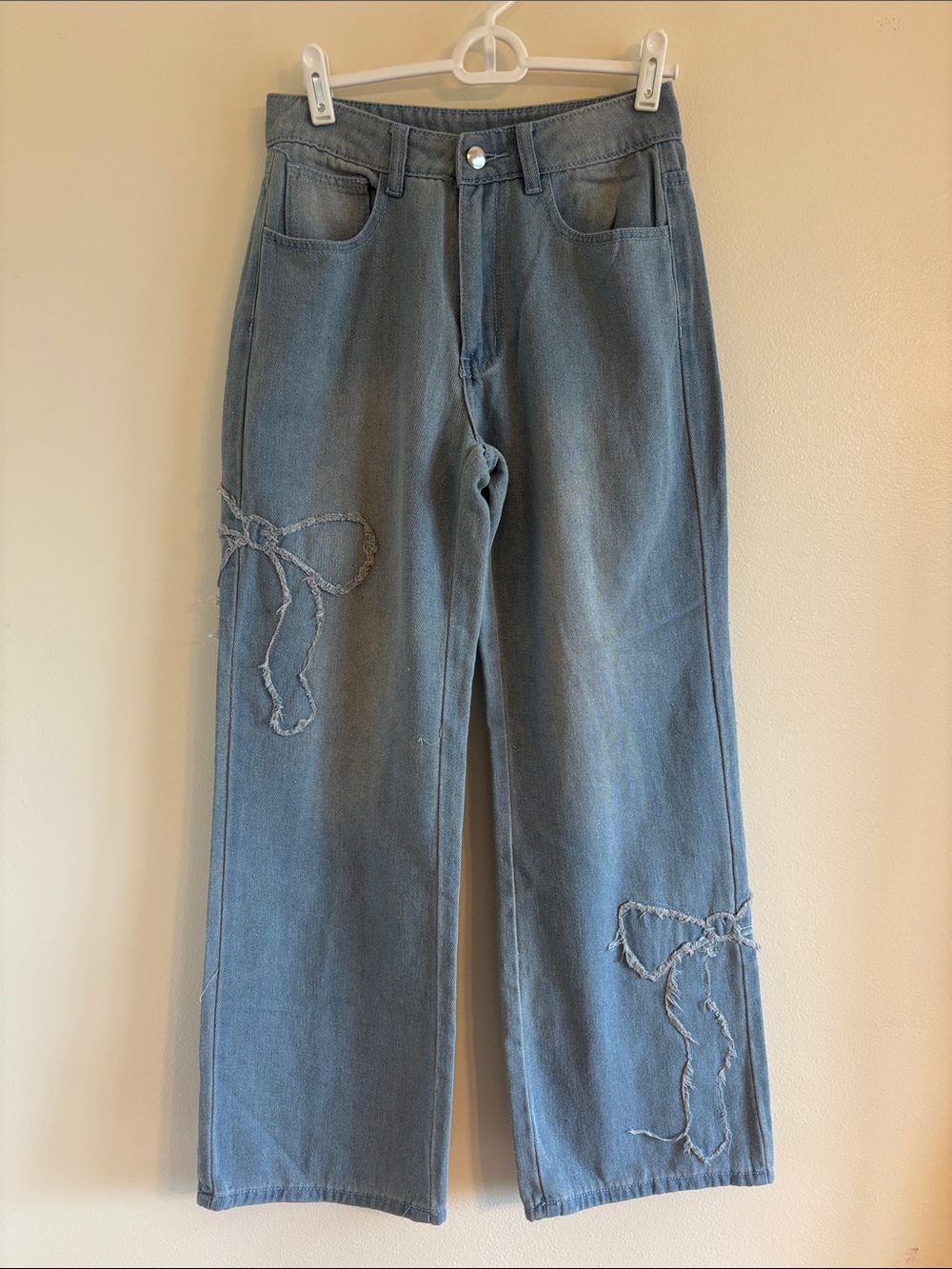 Women's Soft Light Blue Wide-Leg Jeans with Bow Design